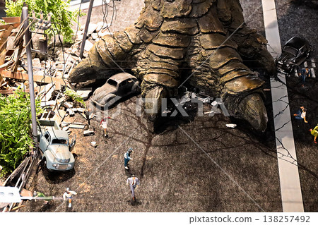 Giant monster's foot and miniature model Giant monster's foot and miniature model 138257492