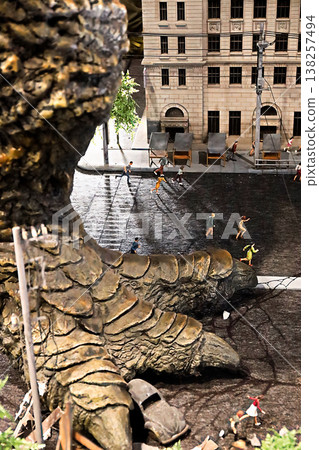 Giant monster's foot and miniature model Giant monster's foot and miniature model 138257494