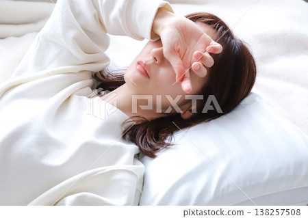 A woman who falls asleep due to poor physical condition A woman who falls asleep due to poor physical condition 138257508