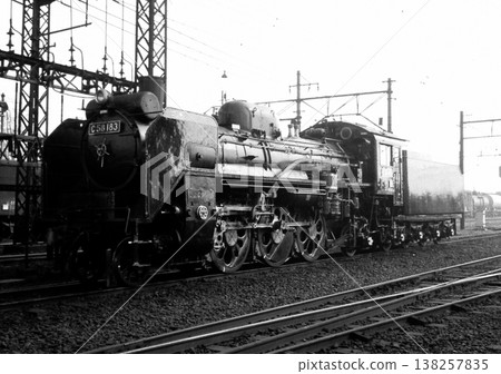 C58 type locomotive waiting at the locomotive depot 138257835