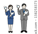 A business person standing with a magnifying glass. 138258373