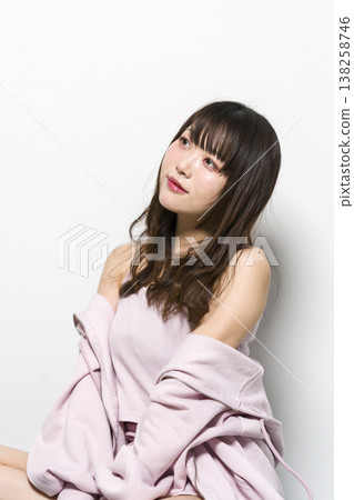 Woman relaxing in room wear Woman relaxing in room wear 138258746