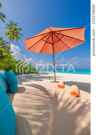 Sunlit tropical paradise beach with elegant sun loungers, umbrellas, and swaying palm trees, turquoise ocean, serene summer travel vibe Sunlit tropical paradise beach with elegant sun loungers, umbrellas, and swaying palm trees, turquoise ocean, serene summer travel vibe 138259666