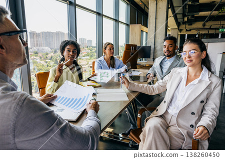 Inclusive strategy meeting with white leader and black colleague 138260450