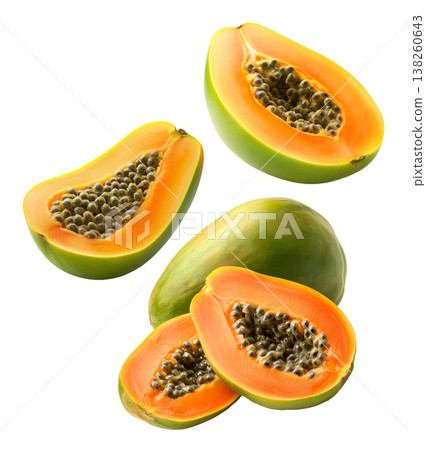 Multiple ripe papaya halves with dark seeds shown isolated on white background, representing a fresh tropical fruit concept Multiple ripe papaya halves with dark seeds shown isolated on white background, representing a fresh tropical fruit concept 138260643