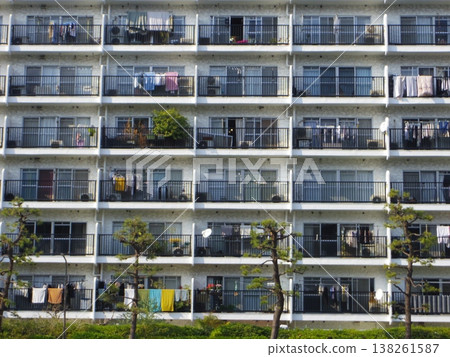 Laundry hanging on the balcony of an apartment building Laundry hanging on the balcony of an apartment building 138261587