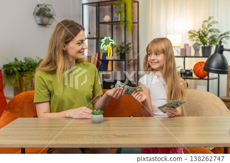 Mother daughter cashier buyer practice give change pay buy plant at table count money coins sum math 138262747