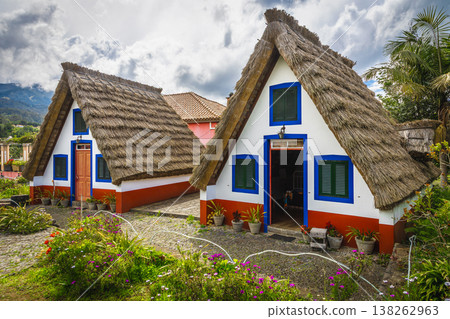 Cute rural wooden houses with thatched roof in Madeira, Portugal Cute rural wooden houses with thatched roof in Madeira, Portugal 138262963