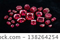 Red rubies on a black background. 138264254