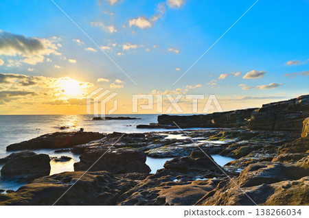 Rocky area illuminated by the setting sun Rocky area illuminated by the setting sun 138266034