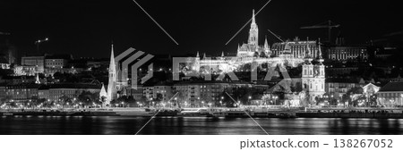 Night panoramic view of Buda Castle with Matthias Church and Fisherman's Bastion above Danube river in Budapest, Hungary 138267052