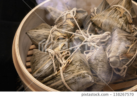 Traditional bamboo steamers for steaming delicious zongzi (sticky rice dumplings) for Dragon Boat Festival Traditional bamboo steamers for steaming delicious zongzi (sticky rice dumplings) for Dragon Boat Festival 138267570