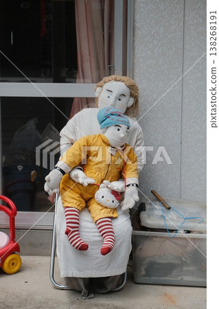Vintage Cloth Dolls Resting On Laundry 138268191