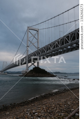Dramatic Bridge View Across Coastal Waters 138268273