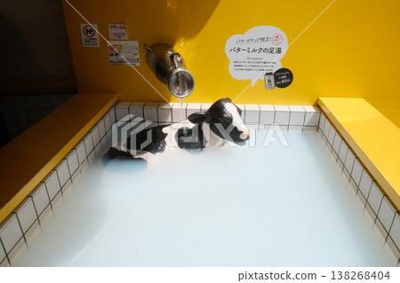 Japanese Cow Relaxing In Outdoor Hot Tub 138268404