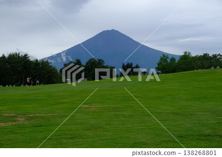 Majestic Mount Fuji Over Green Meadow Landscape Majestic Mount Fuji Over Green Meadow Landscape 138268801