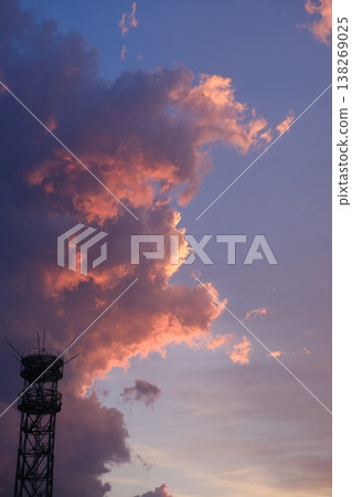 Radiant Sunset With Communications Tower Above Radiant Sunset With Communications Tower Above 138269025