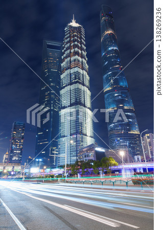 Shanghai's skyscrapers and trails of light create a glittering urban nightscape. 138269236