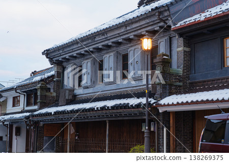 The streetscape of storehouses in Yamamachi-suji, Takaoka City, with snow still remaining. 138269375
