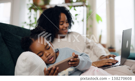 African American mother and child staying home relaxing 138270608