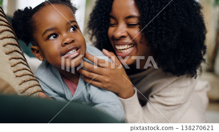 African American mother and daughter sharing happy bonding moments African American mother and daughter sharing happy bonding moments 138270621