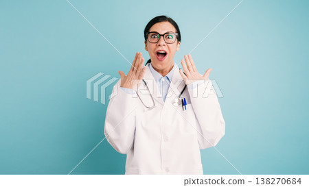 Female doctor receiving surprising news with open mouth 138270684