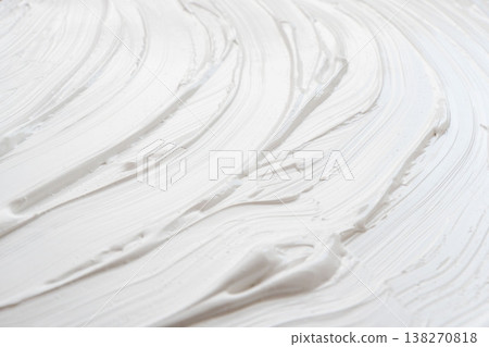 Close-up shot of the texture of spread white acrylic paint 67 Close-up shot of the texture of spread white acrylic paint 67 138270818