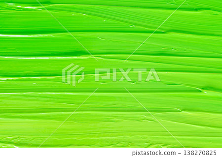 Close-up shot of the texture created by spreading green and yellow acrylic paint 02 Close-up shot of the texture created by spreading green and yellow acrylic paint 02 138270825