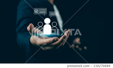 Digital Communication Concept with Person Silhouettes and Review Icons in a Hand, Symbolizing Feedback, Interaction and Networking Opportunities Digital Communication Concept with Person Silhouettes and Review Icons in a Hand, Symbolizing Feedback, Interaction and Networking Opportunities 138270894