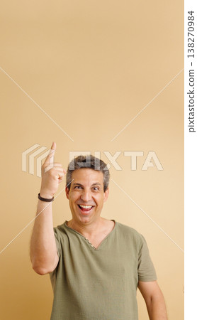 Man getting an idea pointing finger up Man getting an idea pointing finger up 138270984
