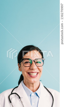 Smiling woman doctor wearing glasses and stethoscope 138270997