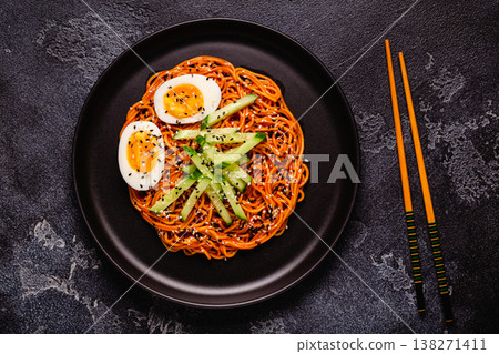 Korean traditional food, cucumber and boiled egg cold spicy noodles. Korean traditional food, cucumber and boiled egg cold spicy noodles. 138271411