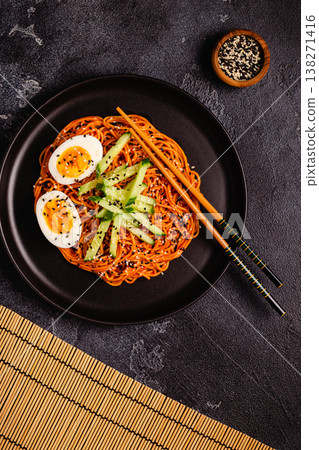 Korean traditional food, cucumber and boiled egg cold spicy noodles. Korean traditional food, cucumber and boiled egg cold spicy noodles. 138271416