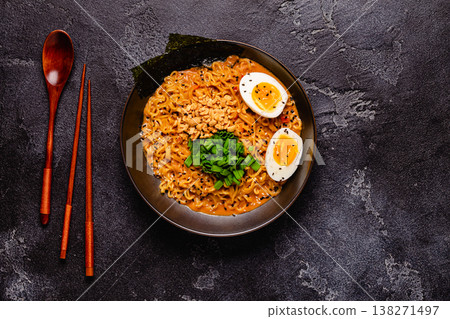 Korean style instant noodle, Shin Ramyeon with peanut and egg. Korean style instant noodle, Shin Ramyeon with peanut and egg. 138271497