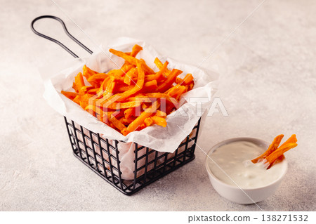 Sweet potato fries with blue cheese sauce. Sweet potato fries with blue cheese sauce. 138271532