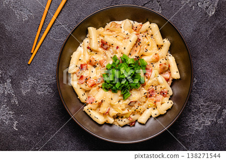 Spicy Rice Cake with Cheese and Bacon or Cream Teokbokki, Tteokbokki. Spicy Rice Cake with Cheese and Bacon or Cream Teokbokki, Tteokbokki. 138271544