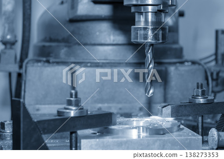 Close-up of a precision drill tool in the prepare position for an automated drilling process on an NC milling machine. 138273353