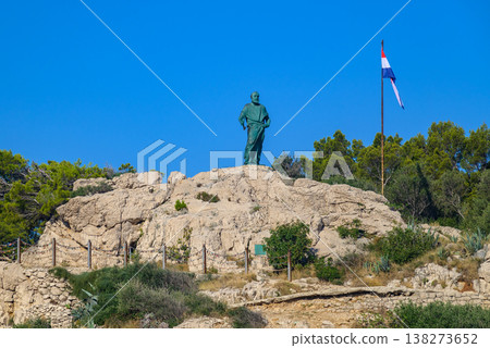 Statute of St. Peter at the entrance to Makarska bay in Makarska, Croatia 138273652