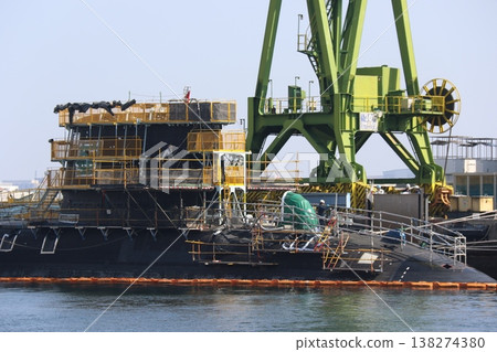 A submarine undergoing routine inspection (overhaul) at Kawasaki Heavy Industries' Kobe Plant, Dock No. 4. 138274380