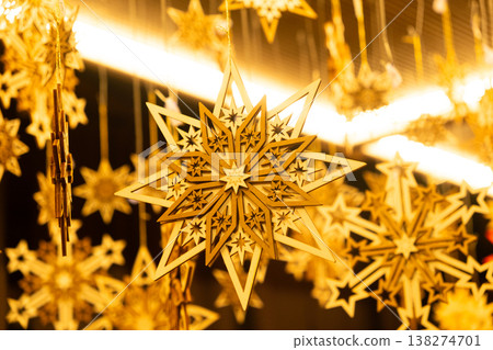 Eco-friendly Christmas decorations made of natural wood, wooden snowflake ornaments. 138274701