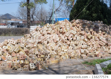 close-up of a mountain of bricks close-up of a mountain of bricks 138277574