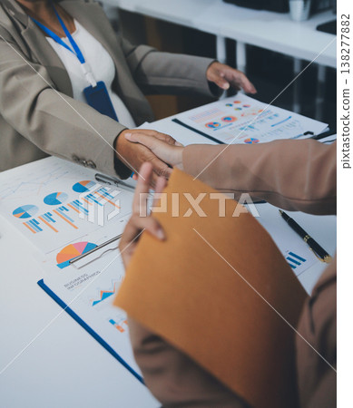 B2b, shaking hands and thank you handshake of a corporate worker in a office. Business deal, partnership and we are hiring gesture with a female hr manager ready for onboarding welcome with trust B2b, shaking hands and thank you handshake of a corporate worker in a office. Business deal, partnership and we are hiring gesture with a female hr manager ready for onboarding welcome with trust 138277882