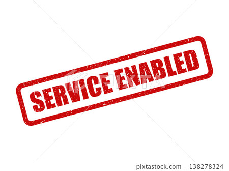 Rectangular rubber stamp with a grunge texture displaying the message SERVICE ENABLED diagonally across its surface 138278324