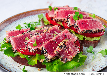 sandwiches with fried tuna fillet in sesame seeds, breakfast, top view, homemade, sandwiches with fried tuna fillet in sesame seeds, breakfast, top view, homemade, 138278941