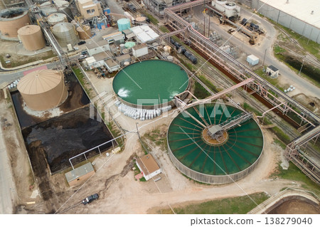 Aerial view of circular industrial tanks at treatment facility Aerial view of circular industrial tanks at treatment facility 138279040