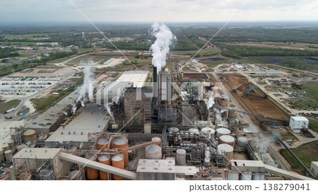 Aerial view of industrial plant with smoke stack and factory complex Aerial view of industrial plant with smoke stack and factory complex 138279041