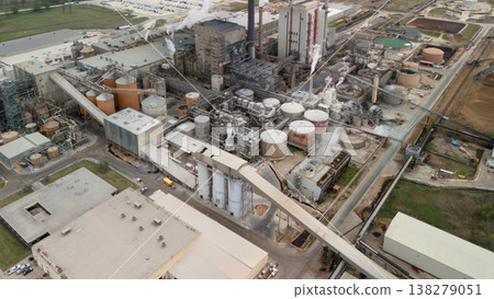 Aerial view of industrial plant with pipelines tanks and factory buildings 138279051