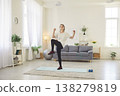 Senior Woman Doing Stretching Exercises at Home for Fitness and Health 138279819