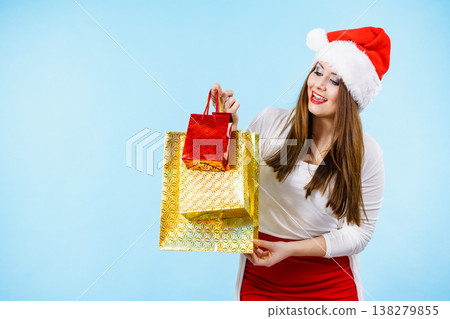 Happy Christmas woman with paper gift bags Happy Christmas woman with paper gift bags 138279855