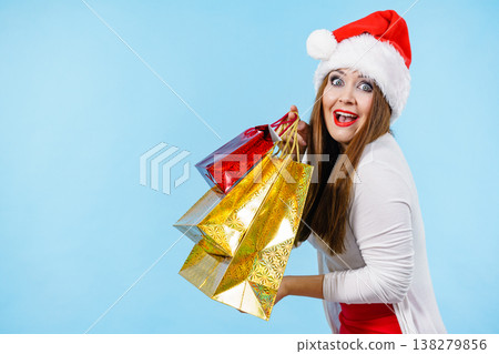 Happy Christmas woman with paper gift bags Happy Christmas woman with paper gift bags 138279856
